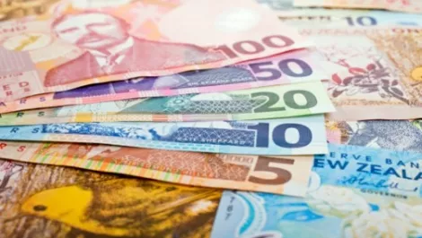 NZ dollar gains after RBNZ's Wheeler keeps rates uncanged, upbeat on local outlook